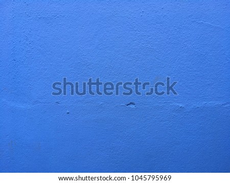 Blue color concrete wall background and texture