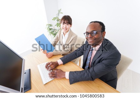 Businesspersons working in office