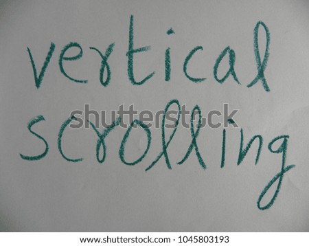 Text vertical scrolling hand written by green oil pastel on white color paper