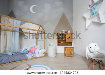 Photo of cosy and light child room interior.  modern room for children at home