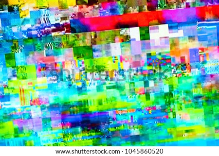 Digital TV glitch on television screen with misplaced squares, static effects and freezing problems during broadcast failure