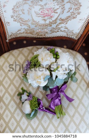 Wedding bouquet with roses and other flowers