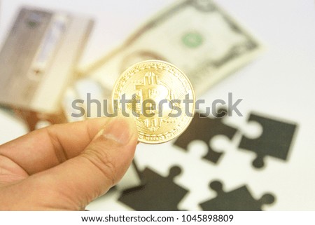 Credit cards, United States dollar and Bitcoin in the hands. payment system concept.