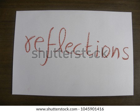 Text reflections hand written by brown oil pastel on white color paper