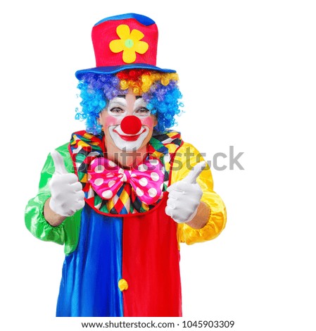 Closeup picture of a clown showing thumbs up gesture