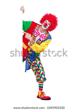 Vertical picture of a clown pointing to blank board 