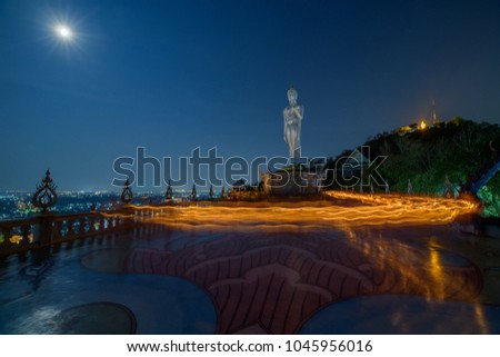 Meditation place of cycle candle lit with buddha image at Makha Bucha Day