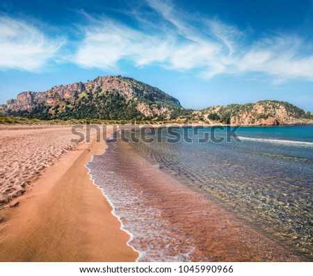 Cozy spring view of Voidokilia beach. Bright morning scene on the Ionian Sea, Pilos town location, Greece, Europe. Beauty of nature concept background. Artistic style post processed photo.