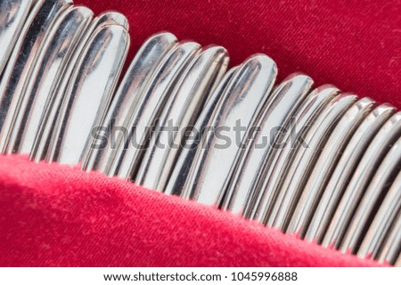 Tail section of spoon in red fabric, Set of Spoons and forks for coffee and tea