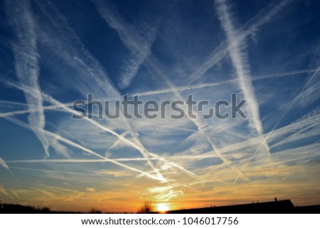 air traffic marks in the sky Royalty-Free Stock Photo #1046017756