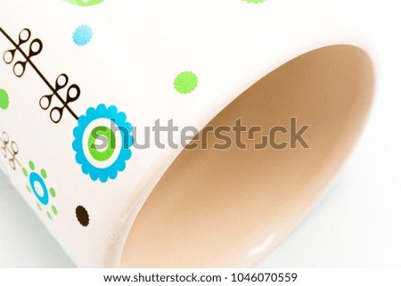 Cost-up ceramic vase  isolated on white background. It copy space and selection focus.