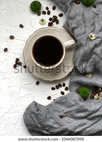 spring coffee. Time for coffee. Mother`s day morning. white cup with black coffee and with spring flowers.