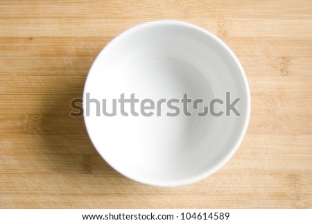 White ceramic bowl Royalty-Free Stock Photo #104614589