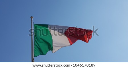 italian flag move by wind in sunny day