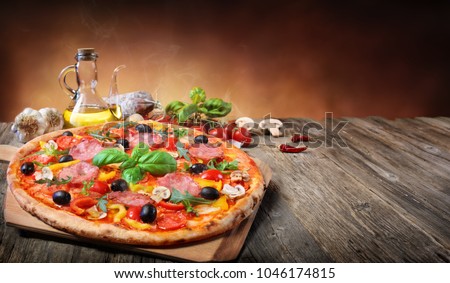 Hot Pizza Served On Old Table