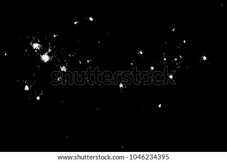 Abstract grainy texture isolated on black background. Top view. Dust, sand blow or bread crumbs. Silhouette of food flakes such as salt or almond or wheat flour spread on the flat surface or table. 