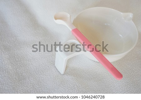 blank baby bowl and spoon : concept for baby food
