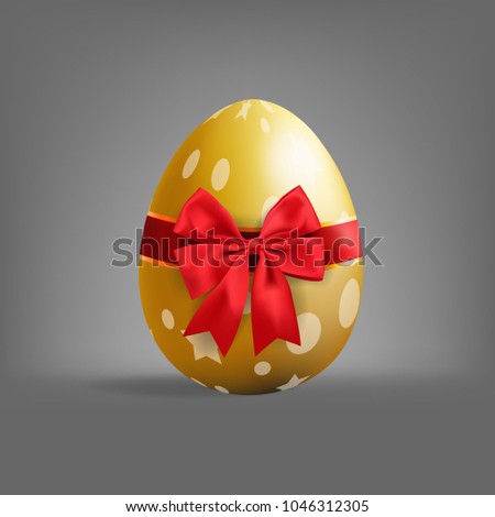 Realistic golden Easter egg tied of red ribbon with a big bow on gray background. vector and illustration.