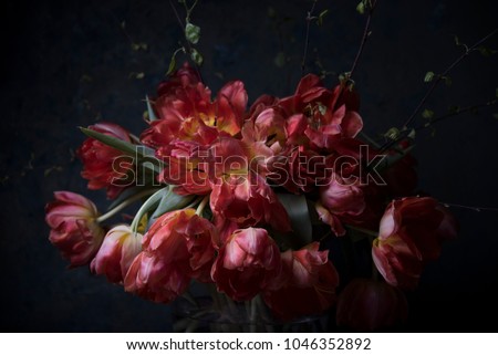 bouquet of flowers on dark background Royalty-Free Stock Photo #1046352892