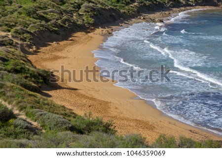 Sand and sea at a sandy beach in the Mediterranean
