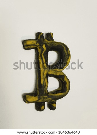 symbol of bitcoin in plasticine, background texture in 3d