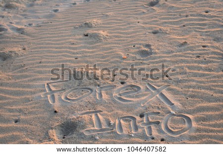 words forex info written on sand.