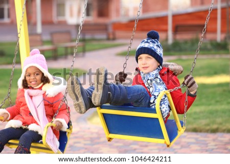Cute little kids on playground. Child adoption