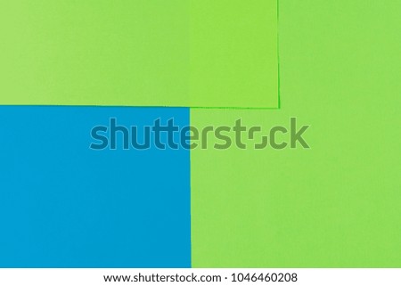 Blue and green paper background. Copy space