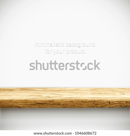Wooden desk of free space for your decoration and white wall background with shadow. 
