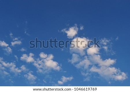 Bright cloud on beautiful blue sky , Fluffy clouds formations at tropical zone