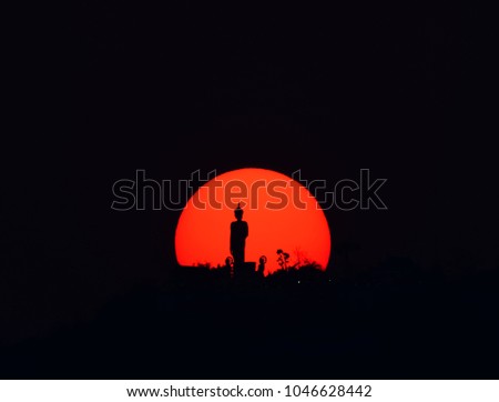 Sunset and Silhouette of buddha
