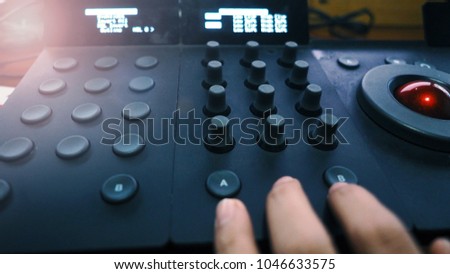 Color grading adjusting controller equipment for editing film or movie colortone in telecine lab post production stage.