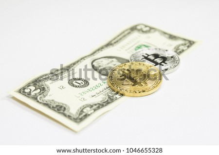 United States dollar and Bitcoin on white background in payment system concept.