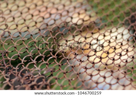 Texture of wire mesh.Steel grating fence background.Close up Metal net,vintage color.Mesh fence/Old Wire Mesh.Simple wired fence pattern.Old metal grid