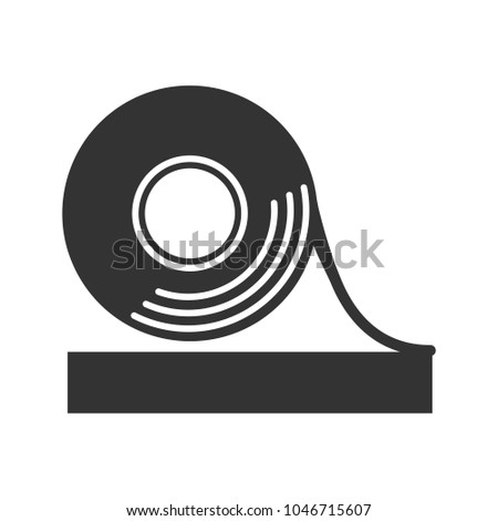 Adhesive tape roll glyph icon. Silhouette symbol. Insulating and electrical tape. Negative space. Vector isolated illustration