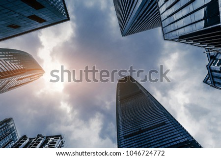 Skyscrapers in the city, towering clouds, black and white photo