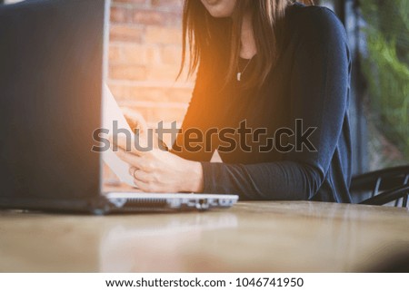 Asia beautiful business woman ,girl using computer notebook working in office,cafe,coffee shop with relax, fun and happy.