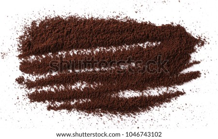 Pile of powdered, instant coffee for espresso isolated on white background, top view
