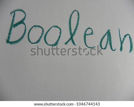 Text Boolean hand written by green oil pastel on white color paper