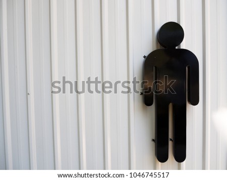 Man restroom sign,toilet sign,WC sign on white metallic background