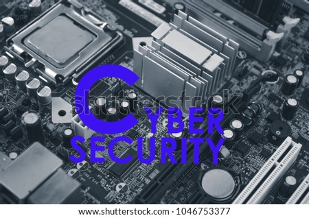 CYBER SECURITY words on computer mother board .