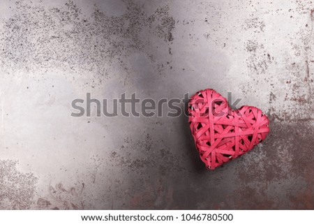 One red love heart on rusty underground