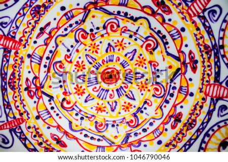 Ceramic plate with indian ornament