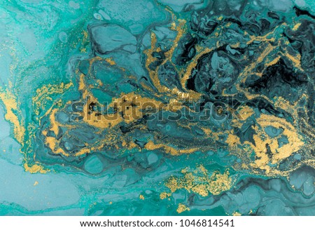 Marble abstract acrylic background. Nature blue marbling artwork texture. Golden glitter. Royalty-Free Stock Photo #1046814541