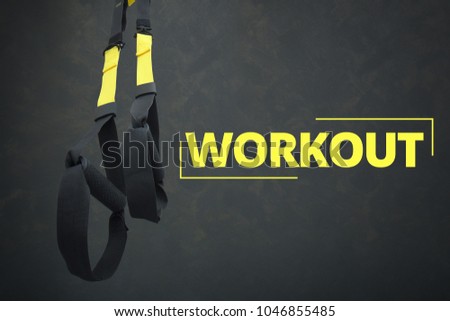 Straps training loop equipment. Black loop functional training equipment on grey background. Sport accessories. Fitness and Gym workout items for Healthy. Advertising banner Royalty-Free Stock Photo #1046855485