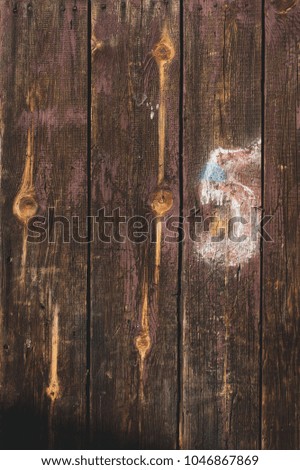 close up of painted wall made of wooden planks.
