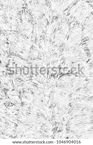 Silver, gray wet abstract paint leaks and splashes texture on white watercolor paper background. Natural organic shapes and design.