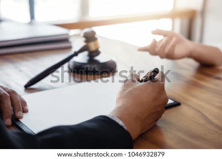 Male lawyer or judge consult having team meeting with client, Law and Legal services concept.