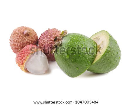 Fresh exotic fruits flat lay on a white background