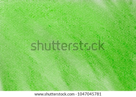 Colorful green chalk pastel texture on white paper background. Abstract pencil strokes.